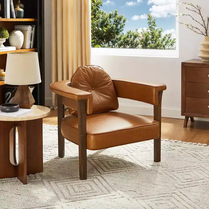Sedia in pelle con telaio in legno di frassino